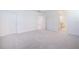 Spacious bedroom with neutral carpeting and ample natural light at 25388 Alicante Dr, Punta Gorda, FL 33955