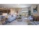 Bright living room with large windows and comfortable seating at 25533 Calusa Dr, Punta Gorda, FL 33955