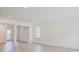 Bright living room with hardwood floors and entryway view at 0000 Hartsdale St, North Port, FL 34287