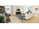 Relaxing living room with ample seating and a large TV at 3194 Cabo St, North Port, FL 34291