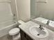 Clean bathroom with bathtub, toilet, and vanity with sink at 530 Glenn Cross Dr, Ruskin, FL 33570