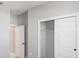 Bright bedroom with a large closet and neutral colored walls at 522 Sun Chaser Dr, Nokomis, FL 34275