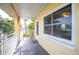 Private balcony overlooking the water with access to unit at 9715 Harrell Ave # 40, Treasure Island, FL 33706