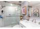 Modern bathroom with a walk-in shower and updated fixtures at 9715 Harrell Ave # 40, Treasure Island, FL 33706