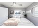 Bright bedroom with a king-size bed and stylish decor at 9715 Harrell Ave # 40, Treasure Island, FL 33706