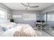 Relaxing bedroom with a queen-size bed and mirrored closet at 9715 Harrell Ave # 40, Treasure Island, FL 33706