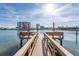Private dock with seating and waterfront views at 9715 Harrell Ave # 40, Treasure Island, FL 33706