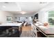 Modern kitchen with island and open layout to living area at 9715 Harrell Ave # 40, Treasure Island, FL 33706