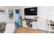 Living room with stylish decor and a large TV at 9715 Harrell Ave # 40, Treasure Island, FL 33706