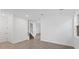 Spacious living area with hardwood floors and a staircase leading upstairs at 1005 Signet, Apollo Beach, FL 33572