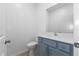 Simple bathroom with toilet and vanity at 17355 Peregrine Way, Punta Gorda, FL 33982