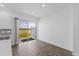 Bright dining area with sliding glass doors leading to a patio at 17343 Peregrine Way, Punta Gorda, FL 33982