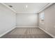 Simple bedroom with carpet and one window at 101 Runaway Field Ave, Nokomis, FL 34275