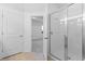 Bathroom with shower and access to bedroom at 9572 Vibrant Lane, Venice, FL 34292