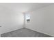 Spacious bedroom with carpeted floors and a window at 9572 Vibrant Lane, Venice, FL 34292
