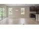 Spacious dining area with sliding doors and large windows at 25134 Doredo Dr, Punta Gorda, FL 33955