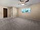 Large bedroom with carpet and walk-in closet at 272 Algiers Dr, Venice, FL 34293