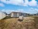 Single story home with grassy yard and generator at 272 Algiers Dr, Venice, FL 34293