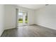 Bedroom with sliding glass door leading to backyard patio at 396 Lazy Shore Dr, Nokomis, FL 34275