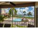 Balcony overlooking the community pool and waterfront at 6268 Palma Del Mar S Blvd # 204, St Petersburg, FL 33715