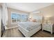 Bright bedroom with water views and comfortable bedding at 6268 Palma Del Mar S Blvd # 204, St Petersburg, FL 33715