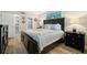 Main bedroom with a king-size bed and stylish decor at 6268 Palma Del Mar S Blvd # 204, St Petersburg, FL 33715