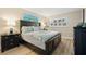 Main bedroom with king-size bed and coastal decor at 6268 Palma Del Mar S Blvd # 204, St Petersburg, FL 33715