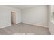 Bedroom with carpet, neutral colored walls, and a window with blinds at 14009 Crutchfield Ct, Parrish, FL 34219