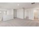 Bonus room features neutral walls and carpet, with access to bathroom at 14009 Crutchfield Ct, Parrish, FL 34219
