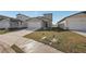 Beautiful home with a well-manicured lawn and driveway, showcasing its appealing curb appeal at 14009 Crutchfield Ct, Parrish, FL 34219