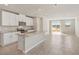 Modern kitchen featuring granite countertops, stainless steel appliances, an island, and an open layout at 14009 Crutchfield Ct, Parrish, FL 34219
