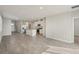 Bright and airy living space featuring tile flooring, open concept design, and abundant natural light at 14009 Crutchfield Ct, Parrish, FL 34219