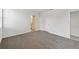 Spacious bedroom with neutral carpeting and an ensuite bathroom at 156 Lazy Shore Dr, Nokomis, FL 34275