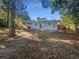 Large backyard with mature trees and open space at 4185 Barracuda Se Dr, St Petersburg, FL 33705