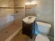 Bathroom with shower, vanity and toilet at 4185 Barracuda Se Dr, St Petersburg, FL 33705