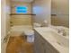 Updated bathroom with a double vanity and a bathtub at 4185 Barracuda Se Dr, St Petersburg, FL 33705