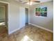 Bedroom with tile floors, closet and access to another room at 4185 Barracuda Se Dr, St Petersburg, FL 33705