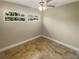 Well-lit bedroom with tile flooring and ample space at 4185 Barracuda Se Dr, St Petersburg, FL 33705