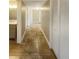Bright hallway with tile floors and linen closet at 4185 Barracuda Se Dr, St Petersburg, FL 33705