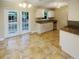 Eat-in kitchen with granite counters and stainless steel appliances at 4185 Barracuda Se Dr, St Petersburg, FL 33705