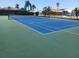 Well-maintained pickleball court with ample space at 7102 42Nd E Ct, Sarasota, FL 34243