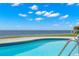 Inviting blue swimming pool with scenic waterfront view at 200 Colony Point S Rd, St Petersburg, FL 33705