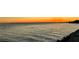 Scenic sunset over calm waters with bridge in the distance at 200 Colony Point S Rd, St Petersburg, FL 33705