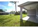 View of backyard from covered patio at 23335 Mac Dougall Ave, Port Charlotte, FL 33980