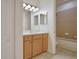Bathroom with vanity, bathtub and shower at 1344 Ribolla Dr, Palm Harbor, FL 34683