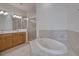 Primary bathroom with soaking tub and double vanity at 1344 Ribolla Dr, Palm Harbor, FL 34683