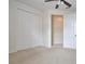Bedroom with double door closet and walk-in closet at 1344 Ribolla Dr, Palm Harbor, FL 34683