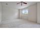 Spacious bedroom with ceiling fan and carpet flooring at 1344 Ribolla Dr, Palm Harbor, FL 34683