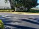 Community entrance with signage and landscaping at 1344 Ribolla Dr, Palm Harbor, FL 34683