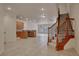 Spacious entryway with tile floors, kitchen and staircase views at 1344 Ribolla Dr, Palm Harbor, FL 34683